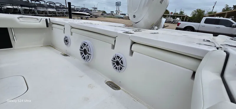 Slide: The Image of Interior view of 2026 Tidewater 2500 Carolina Bay boat with speakers. - 10