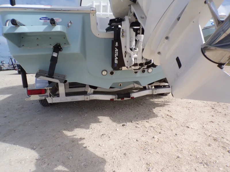 Slide: The Image of Rear view of a 2026 Tidewater 2500 Carolina Bay boat on a trailer. - 16