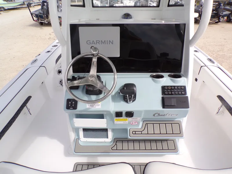 Slide: The Image of 2026 Tidewater 2500 Carolina Bay helm with Garmin system. - 25