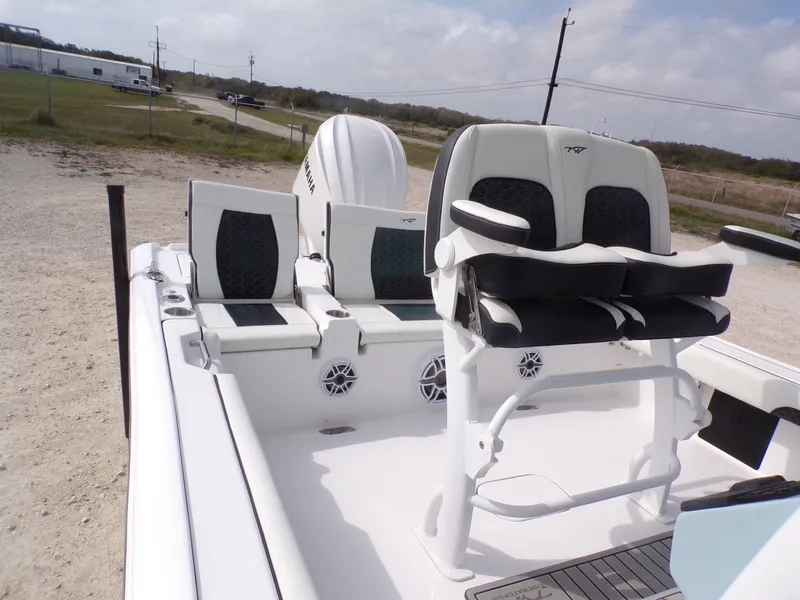 Slide: The Image of 2026 Tidewater 2500 Carolina Bay boat, interior view with seating. - 27