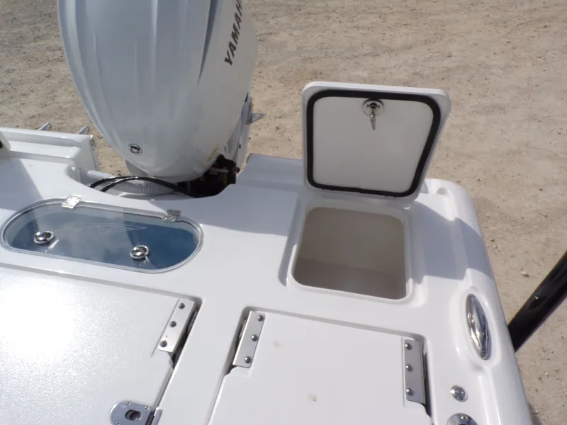 Slide: The Image of Tidewater 2500 Carolina Bay 2026 with Yamaha engine and storage compartment. - 30