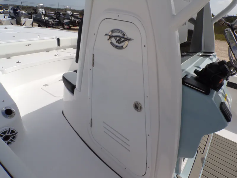 Slide: The Image of 2026 Tidewater 2500 Carolina Bay boat cabin and helm console. - 32