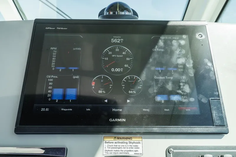 Slide: The Image of Garmin GPS display on 2016 Boston Whaler 315 Conquest boat dashboard. - 34