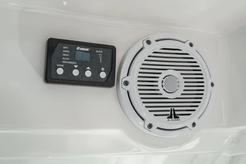 Slide: The Image of Control panel and JL Audio speaker on 2016 Boston Whaler 315 Conquest boat. - 39