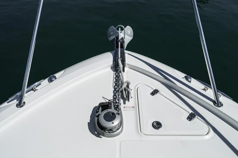 Slide: The Image of Bow of 2016 Boston Whaler 315 Conquest with anchor and railing. - 8