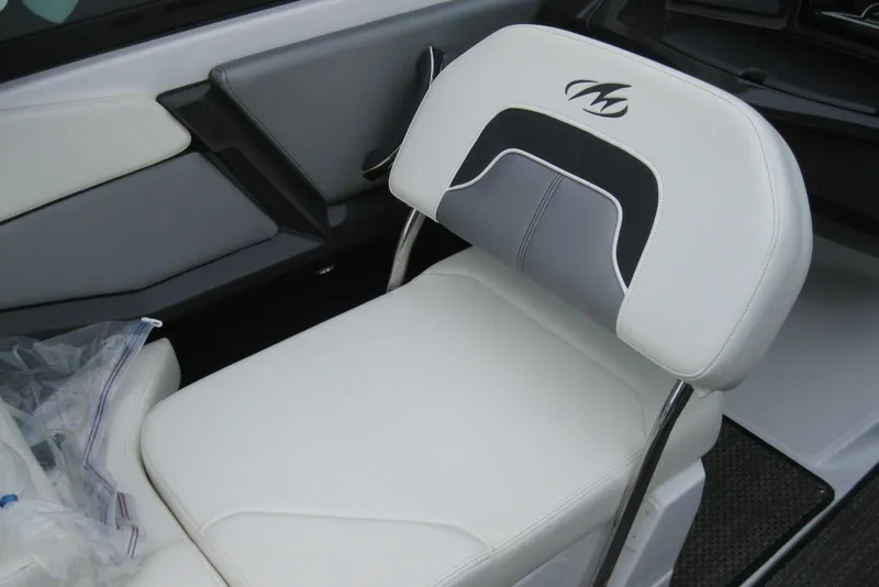 Slide: The Image of White and gray seat in a 2015 Monterey 218SS Super Sport boat interior. - 13