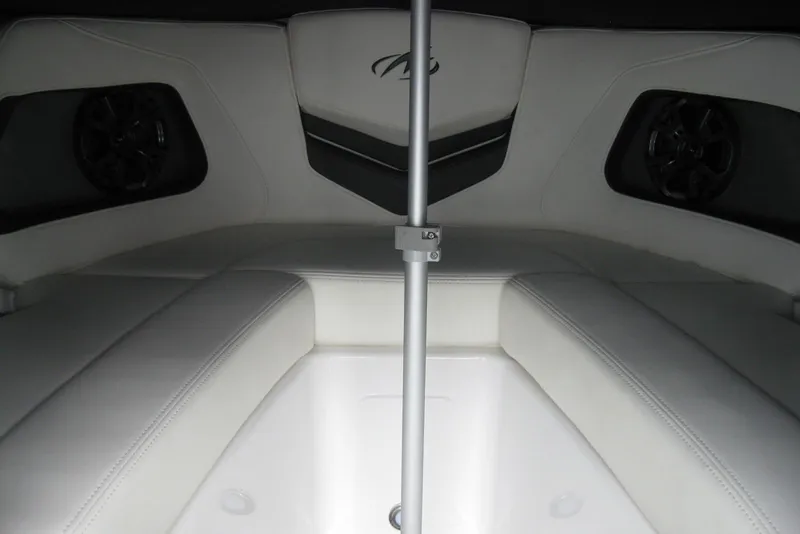 Slide: The Image of Interior of 2015 Monterey 218SS Super Sport boat with white seating and speakers. - 16