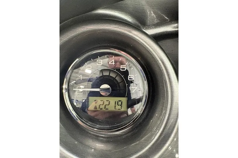Slide: The Image of Close-up of a 2015 Monterey 218SS Super Sport tachometer displaying 221.9 RPM. - 18