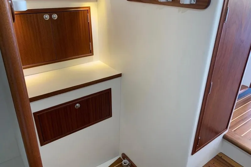 Slide: The Image of Luxurious interior of 2024 Composite Yacht CY 42, featuring elegant wood cabinetry and modern design. - 10