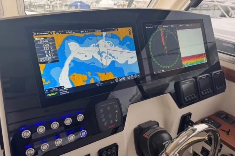 Slide: The Image of Helm of 2024 Composite Yacht CY 42 with advanced navigation displays and controls. - 7