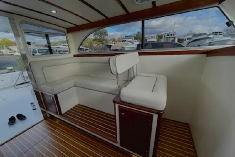 Slide: The Image of Luxurious interior of 2024 Composite Yacht CY 42 with elegant seating and wood flooring. - 8