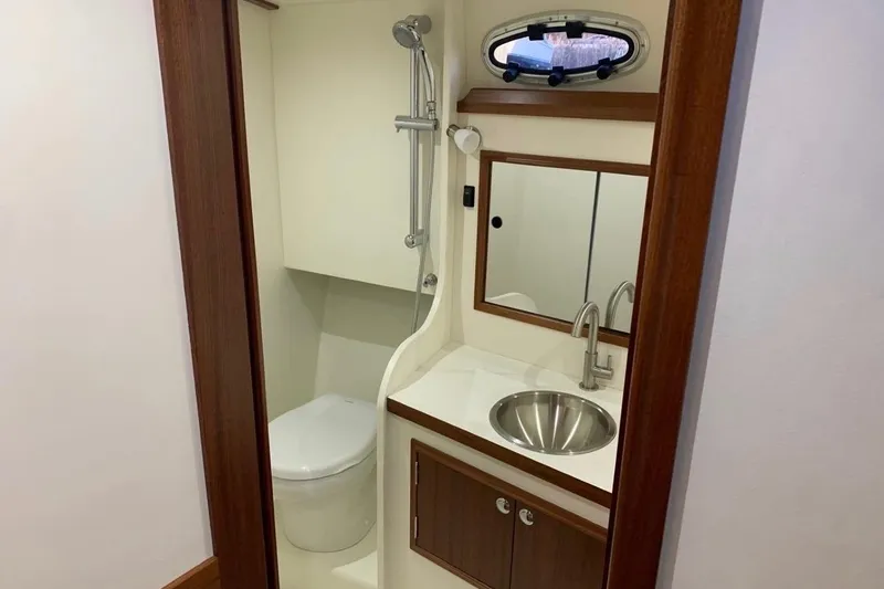 Slide: The Image of Luxurious bathroom in 2024 Composite Yacht CY 42, featuring modern fixtures and elegant wood accents. - 9