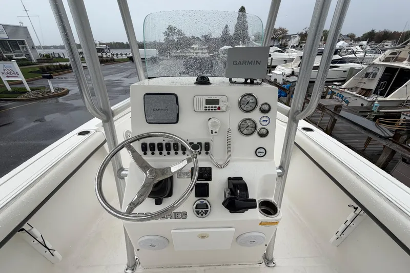 Slide: The Image of 2010 Sea Fox 216 Center Console boat dashboard with Garmin navigation system. - 17