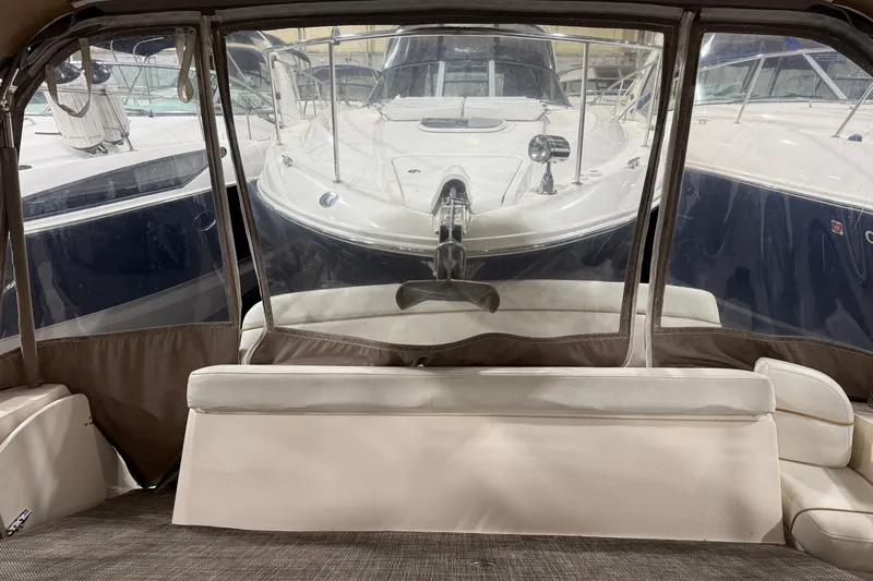Slide: The Image of 2002 Rinker Fiesta Vee 342 yacht interior with view of docked boats. - 5