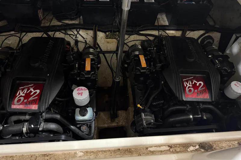 Slide: The Image of Twin MerCruiser MX 6.2 MPI engines in a 2002 Rinker Fiesta Vee 342 boat. - 6