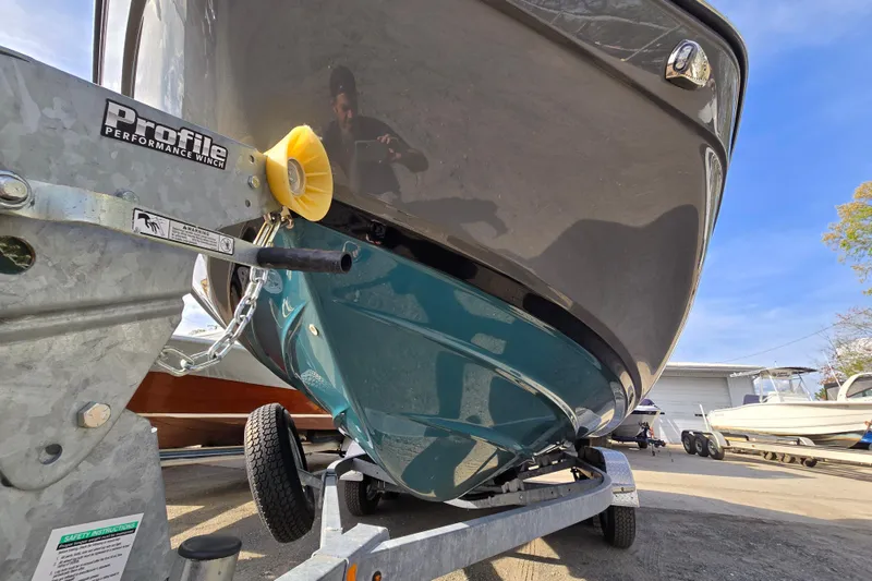 Slide: The Image of 2022 Yamaha Boats 212S on trailer, showcasing hull and Profile Performance winch. - 3