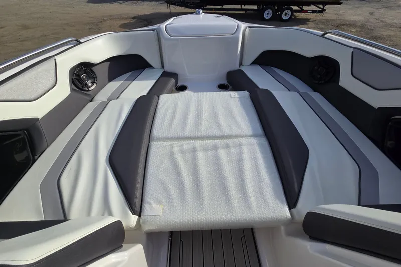 Slide: The Image of 2022 Yamaha Boats 212S interior with cushioned seating and speakers. - 41