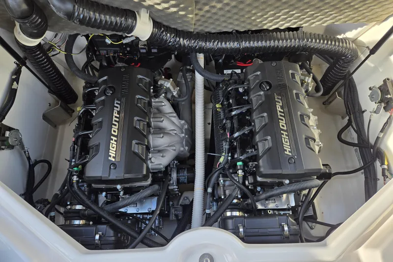 Slide: The Image of 2022 Yamaha Boats 212S high output engines in engine compartment. - 51