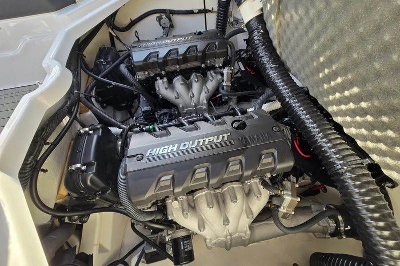 Slide: The Image of 2022 Yamaha Boats 212S engine compartment showcasing high output engines. - 52
