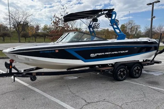 The Image of 2018 Nautique Super Air Nautique GS22 boat on trailer in parking lot. - 0