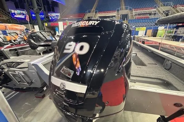 Slide: The Image of 2026 Crestliner 1850 Pro Tiller with Mercury 90 engine at a boat show. - 25