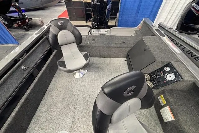 Slide: The Image of 2026 Crestliner 1850 Pro Tiller boat interior with dual seats and control panel. - 6
