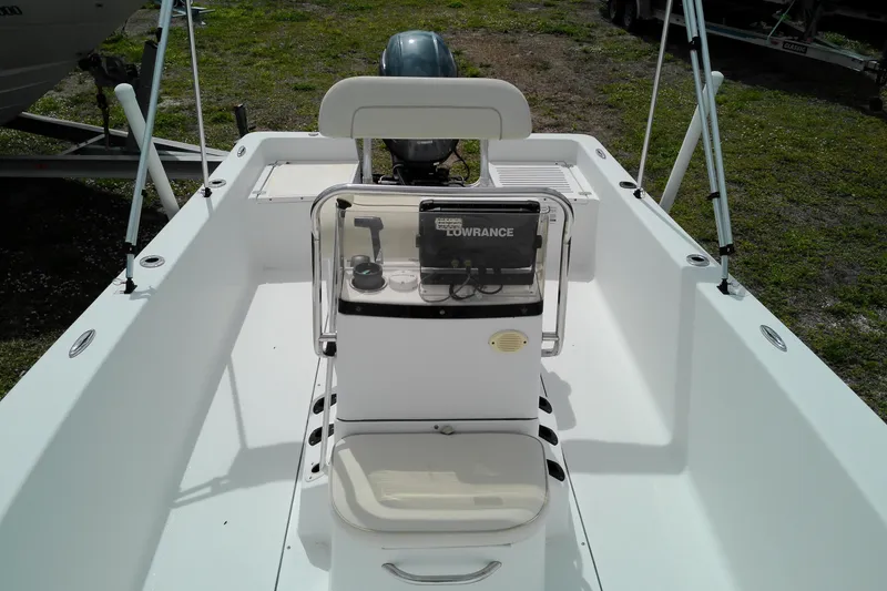 Slide: The Image of 2018 Sportsman Island Reef 19 Center Console boat interior with navigation equipment. - 4