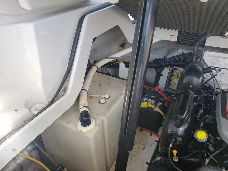 Slide: The Image of Engine compartment of a 2013 Crownline 264 CR boat. - 13