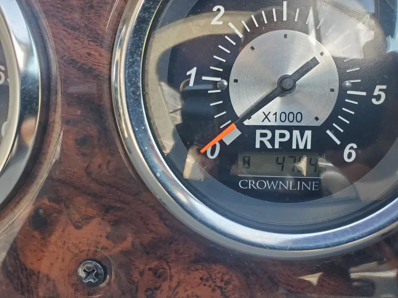 Slide: The Image of Tachometer of a 2013 Crownline 264 CR boat, displaying 474 hours. - 17