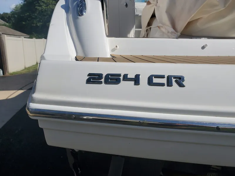 Slide: The Image of Rear view of a 2013 Crownline 264 CR boat. - 3