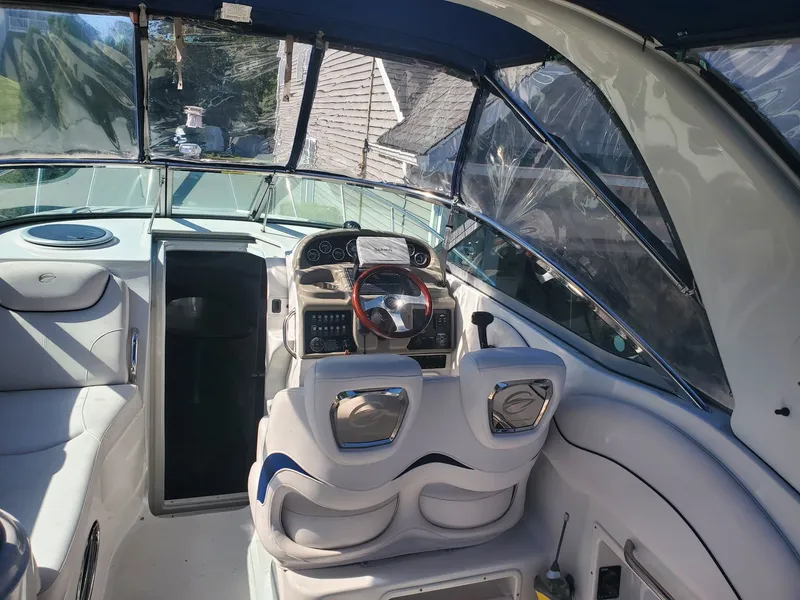 Slide: The Image of Interior of a 2013 Crownline 264 CR yacht with helm station. - 5