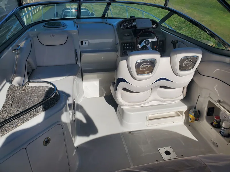 Slide: The Image of Interior of a 2013 Crownline 264 CR yacht with helm station. - 7