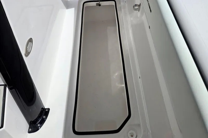Slide: The Image of Storage compartment of 2026 Twin Vee 280 GFX2 CC boat, featuring sleek design and durable materials. - 16