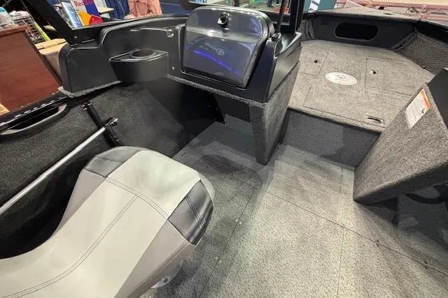 Slide: The Image of 2026 Crestliner 1850 Kodiak WT interior with seating and console, showcasing modern design. - 12