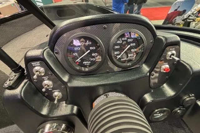Slide: The Image of Dashboard of 2026 Crestliner 1850 Kodiak WT boat with speedometer and RPM gauges. - 14