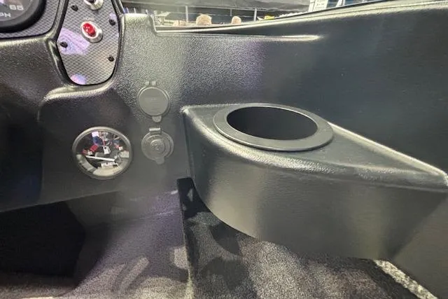 Slide: The Image of Interior view of 2026 Crestliner 1850 Kodiak WT boat dashboard with cup holder. - 15