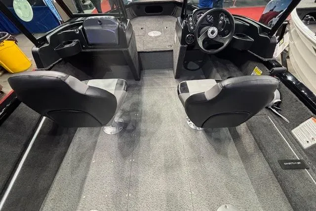 Slide: The Image of 2026 Crestliner 1850 Kodiak WT boat interior with dual seats and steering console. - 17