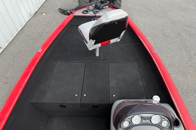 Slide: The Image of 2007 Tracker Pro Team 175 TXW boat interior with red trim and seating. - 11
