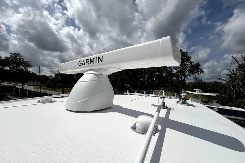 Slide: The Image of Garmin radar on 2026 Contender 32 ST boat under cloudy sky. - 20