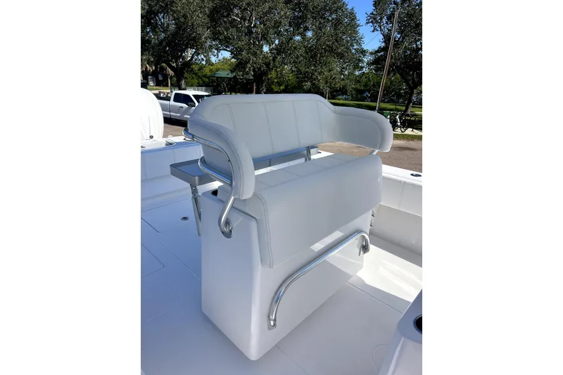 Slide: The Image of 2026 Contender 32 ST boat with sleek white seating and stainless steel accents. - 4