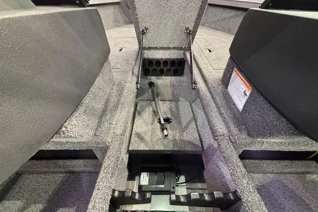 Slide: The Image of Interior view of 2026 Crestliner 1650 Hawk boat storage compartment. - 14