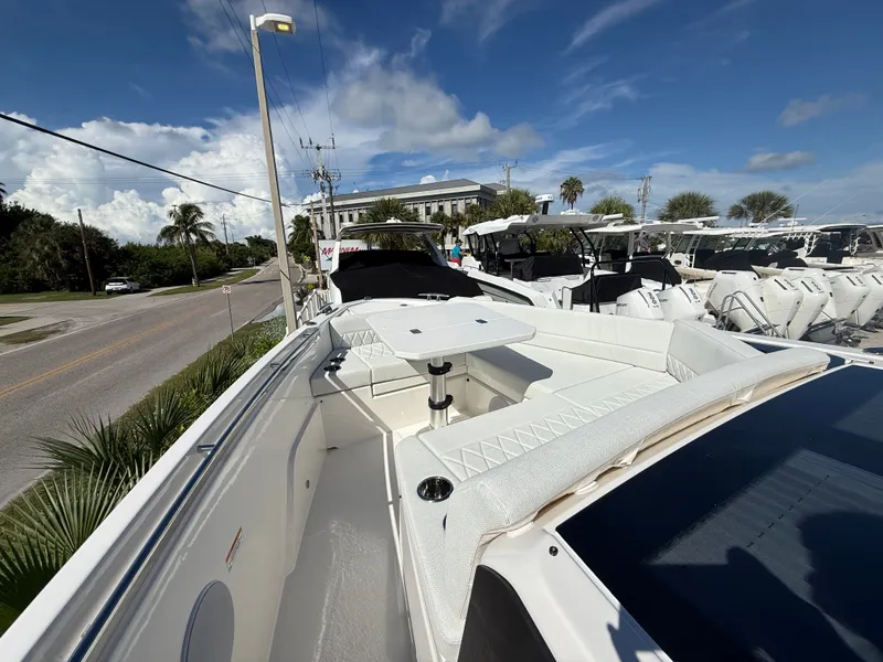 Slide: The Image of The image shows the deck of a 2027 Saxdor 400 GTC with white seating and a table. - 8