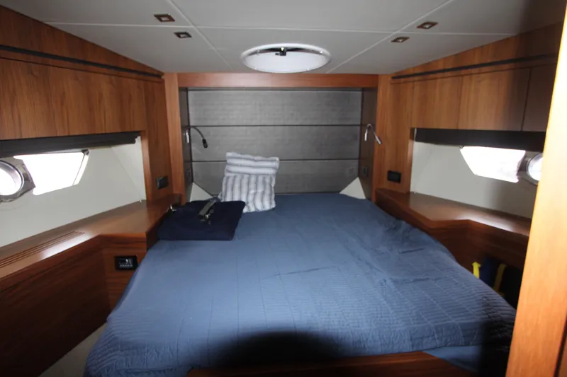 Slide: The Image of Luxurious cabin interior of 2014 Sunseeker Manhattan 55 yacht with cozy bedding. - 19