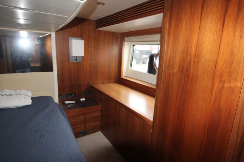 Slide: The Image of Luxurious wooden interior of 2014 Sunseeker Manhattan 55 yacht cabin. - 23
