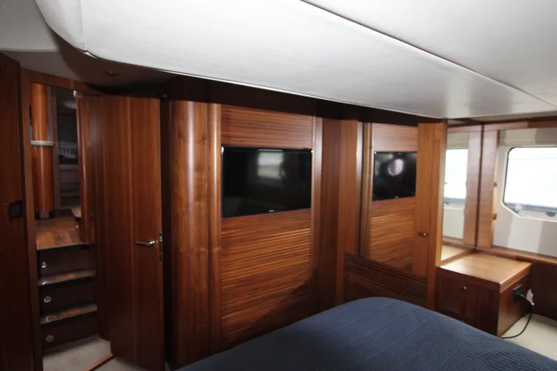 Slide: The Image of Luxurious interior of 2014 Sunseeker Manhattan 55 yacht with wood paneling and modern amenities. - 25