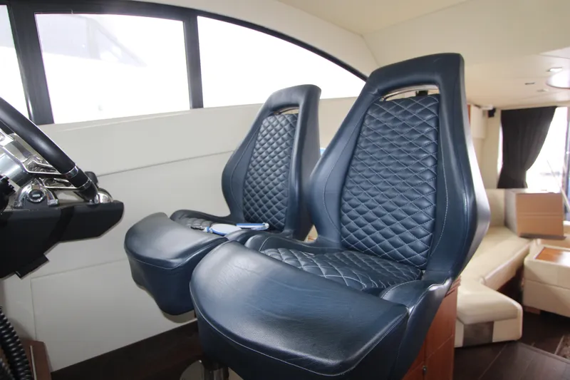 Slide: The Image of Luxurious leather seating in 2014 Sunseeker Manhattan 55 yacht interior. - 28