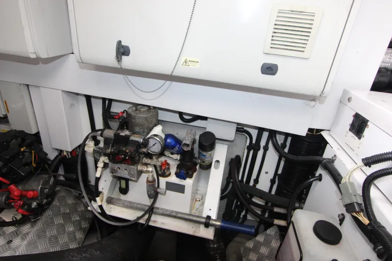Slide: The Image of Engine room of a 2014 Sunseeker Manhattan 55 yacht, showcasing mechanical components. - 42