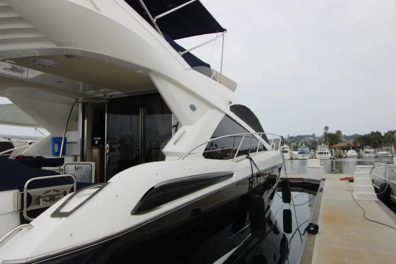Slide: The Image of Luxury Sunseeker Manhattan 55 yacht docked at marina, 2014 model. - 5