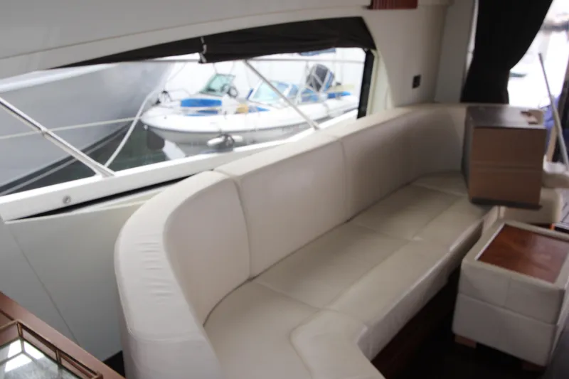 Slide: The Image of Luxurious interior of 2014 Sunseeker Manhattan 55 yacht with white leather seating. - 9