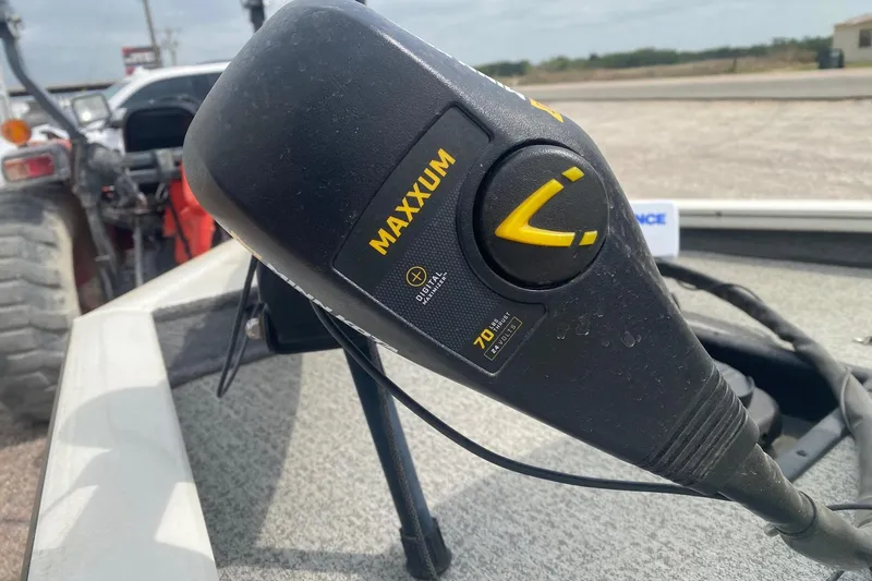 Slide: The Image of Trolling motor control on 2023 Tracker Pro Team 175 TF boat, featuring Maxxum branding. - 8